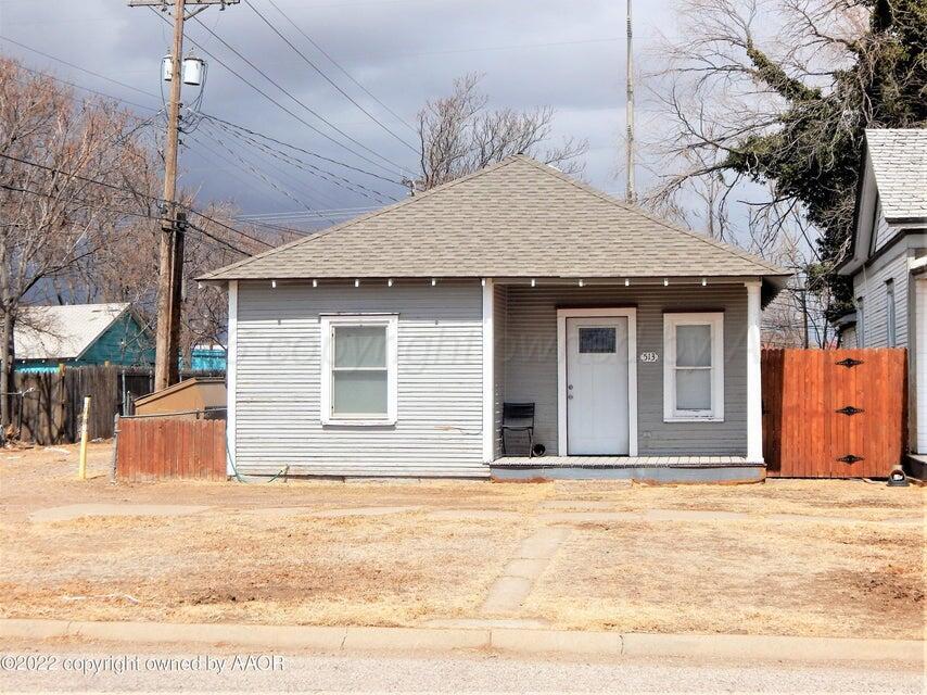 1108 South Lincoln Street Amarillo, TX 79101 - Photo 24 of 25 a house with trees in the background