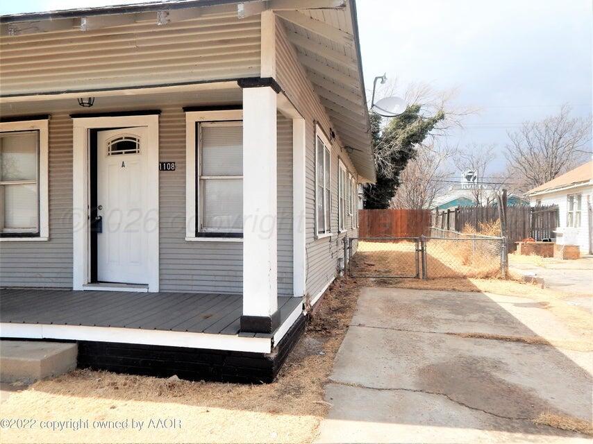 1108 South Lincoln Street Amarillo, TX 79101 - Photo 3 of 25 a view of a house with a outdoor space