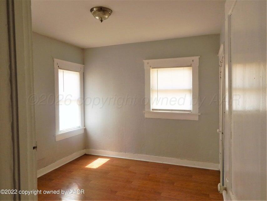 1108 South Lincoln Street Amarillo, TX 79101 - Photo 7 of 25 a view of an empty room with a window