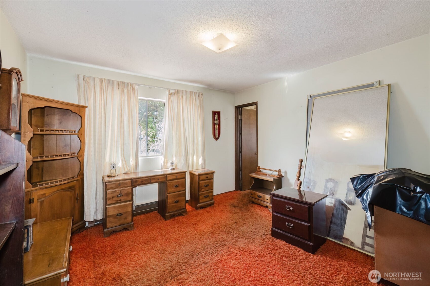 567 Juniper Street Bremerton, WA 98310 - Photo 13 of 37 a room with furniture or couch and a window