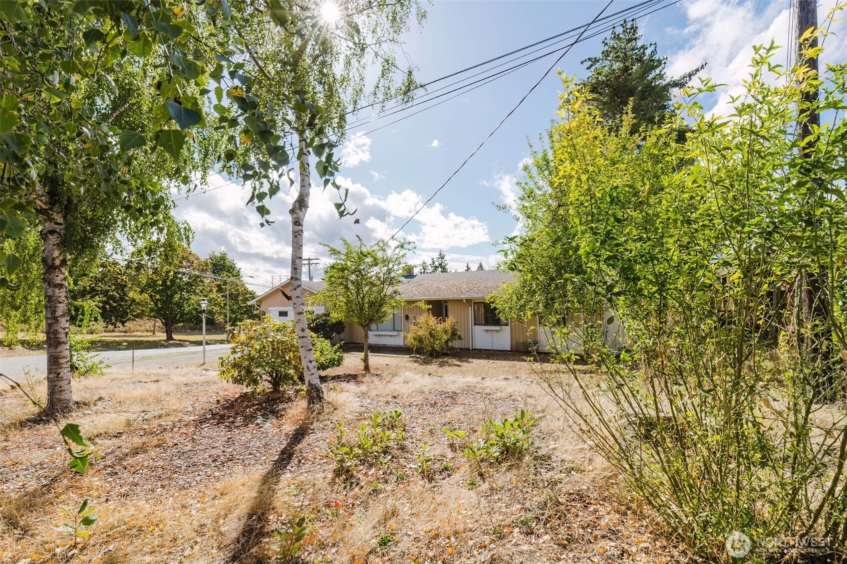 567 Juniper Street Bremerton, WA 98310 - Photo 27 of 37 a view of a backyard with a garden