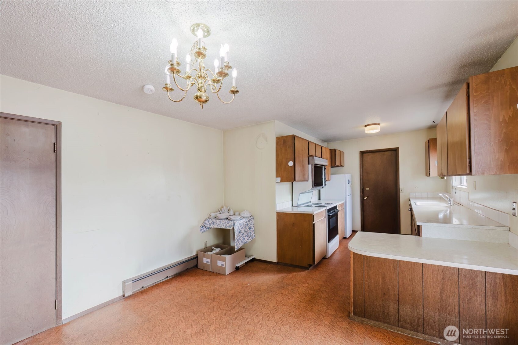 567 Juniper Street Bremerton, WA 98310 - Photo 8 of 37 a view of a livingroom with a furniture chandelier and a window