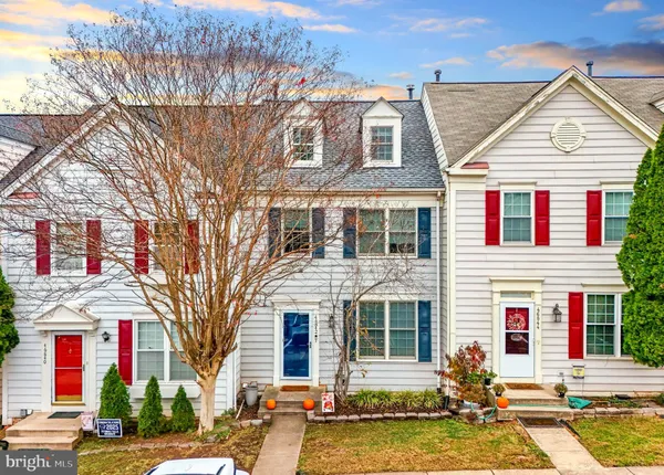 a front view of a house with street