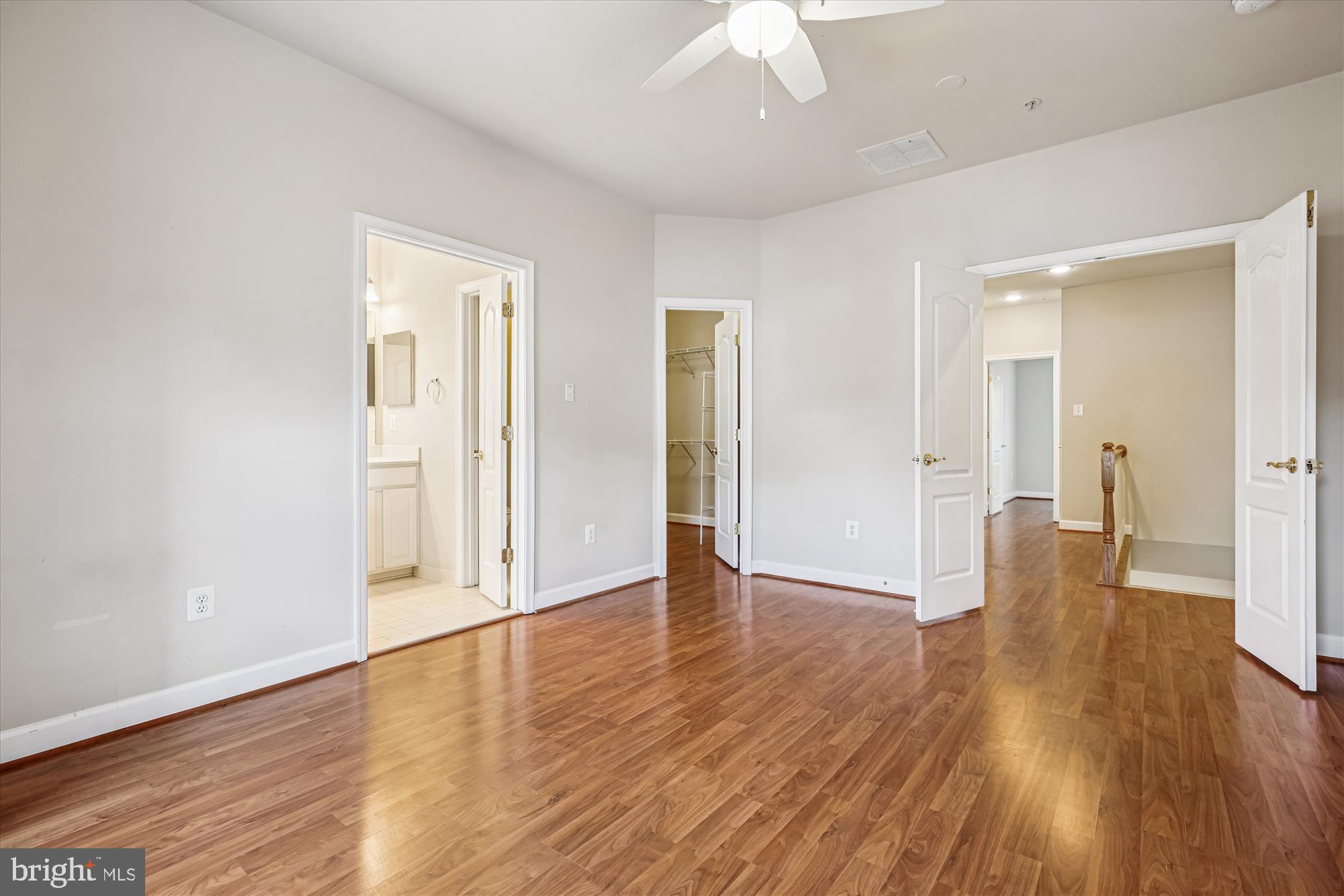 1127 Gaither Road Rockville, MD 20850 - Photo 15 of 36 a view of an empty room with wooden floor