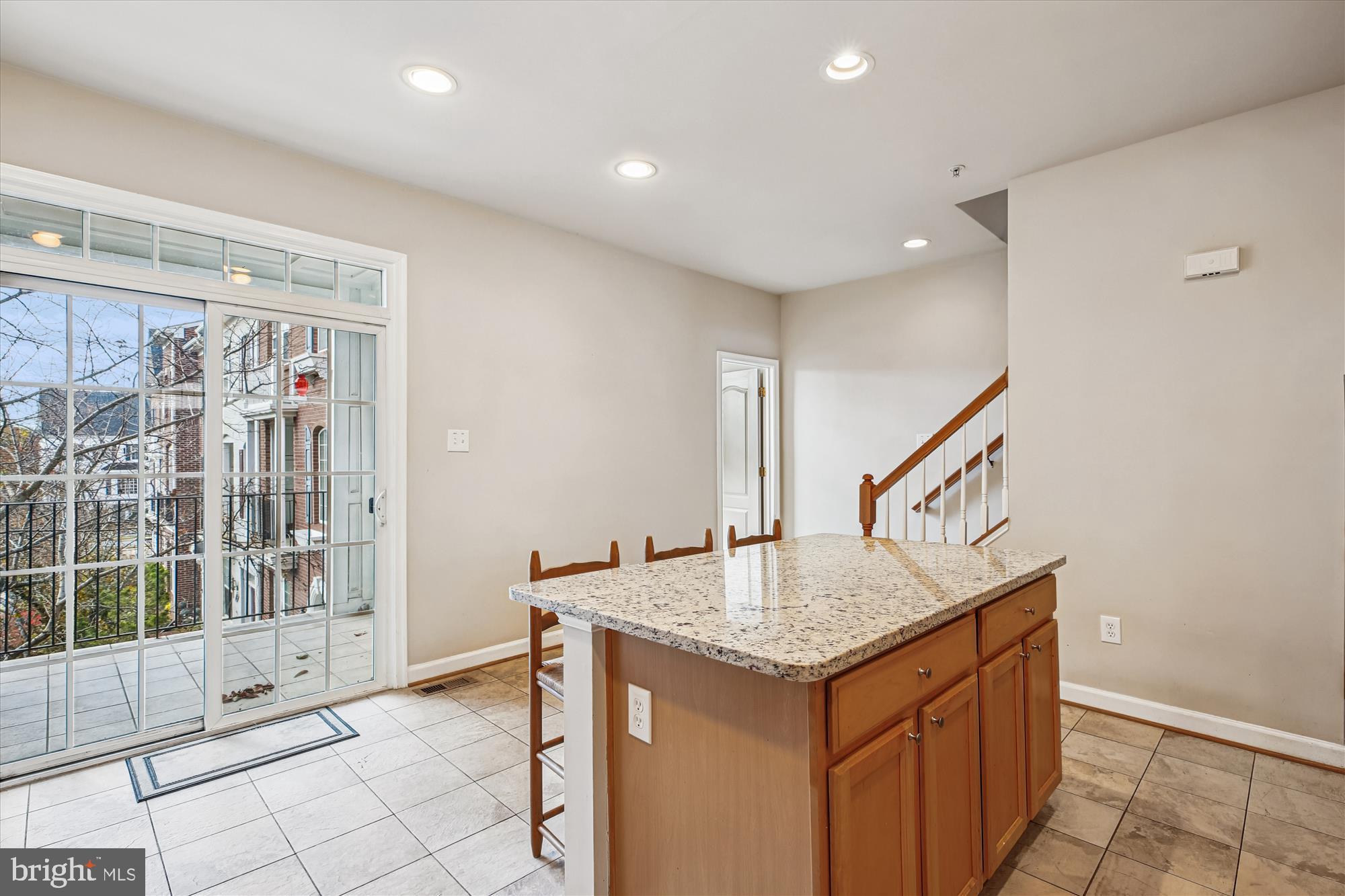 1127 Gaither Road Rockville, MD 20850 - Photo 7 of 36 a kitchen view with granite countertop a sink and cabinets