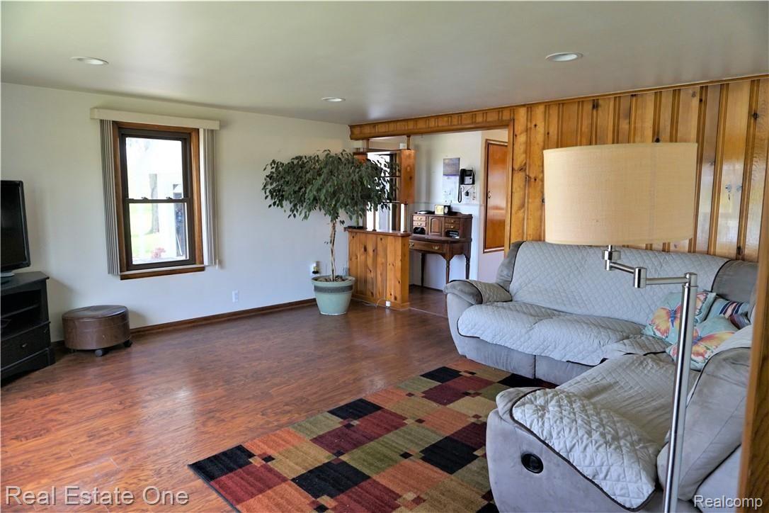 1165 Highland Road Highland, MI 48357 - Photo 2 of 33 Spacious living room with lots of light