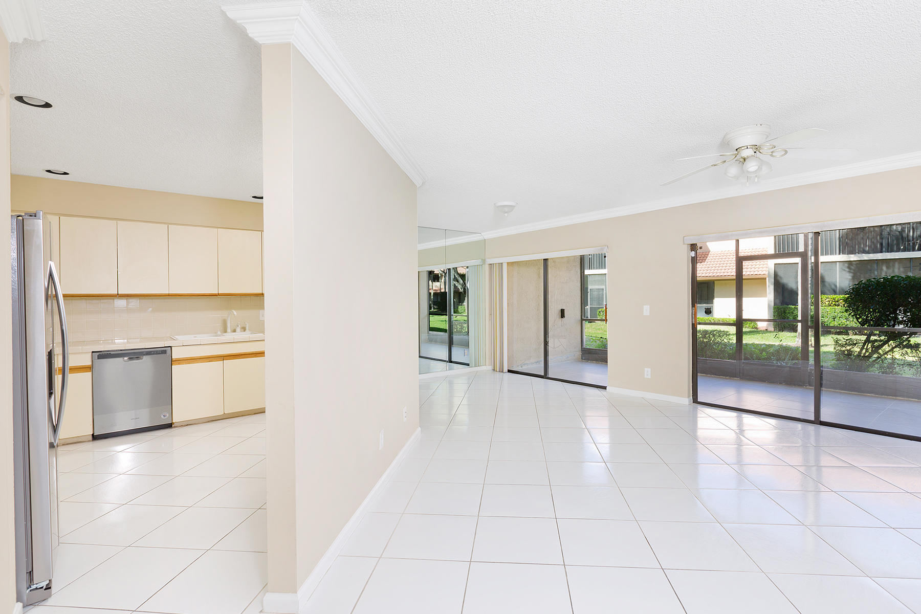 5520 Coach House Circle, Unit B Boca Raton, FL 33486 - Photo 15 of 32 07_Living_Kitchen1