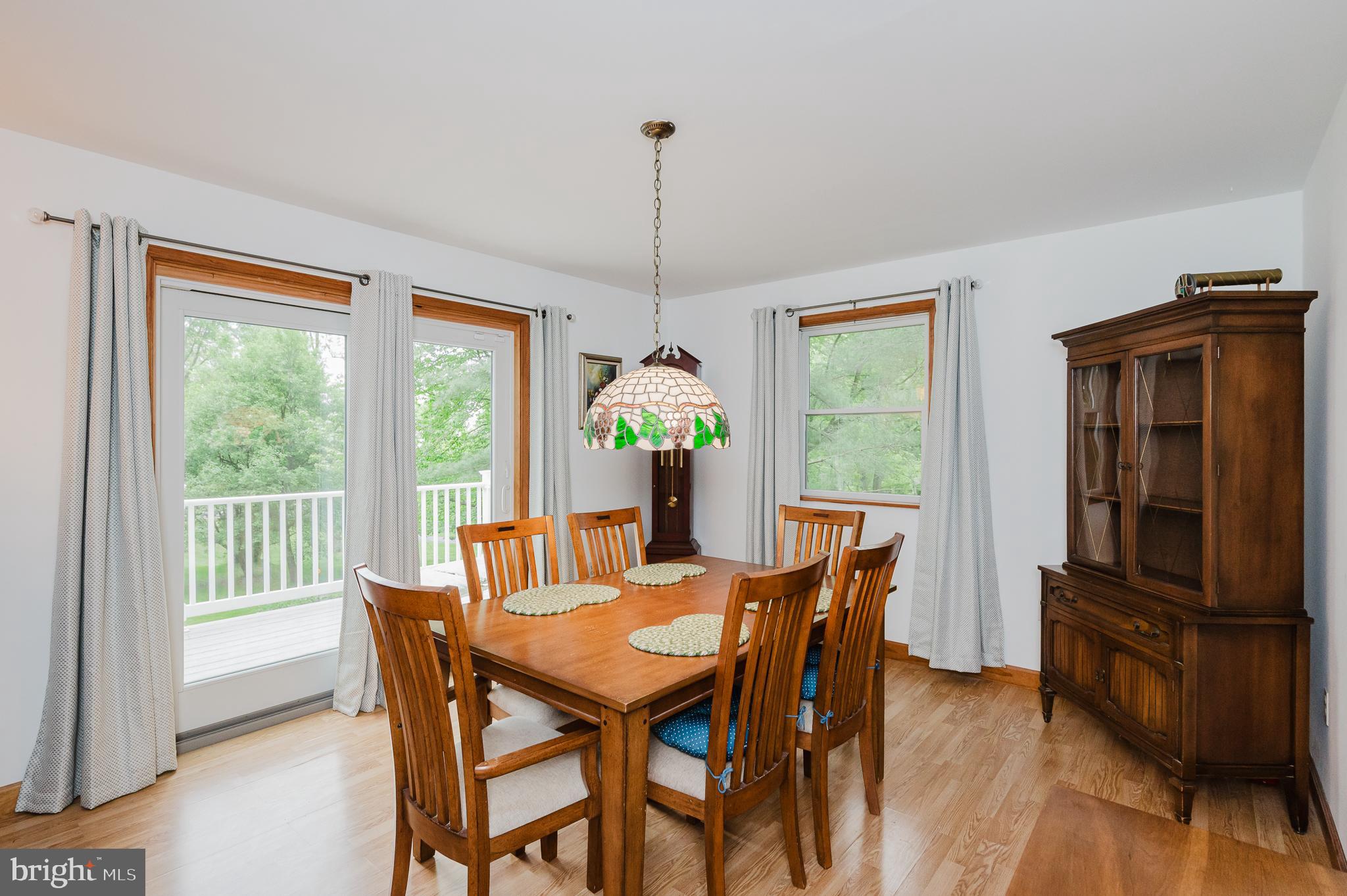 710 Magnolia Road Joppa, MD 21085 - Photo 5 of 58 a dining room with furniture window wooden floor