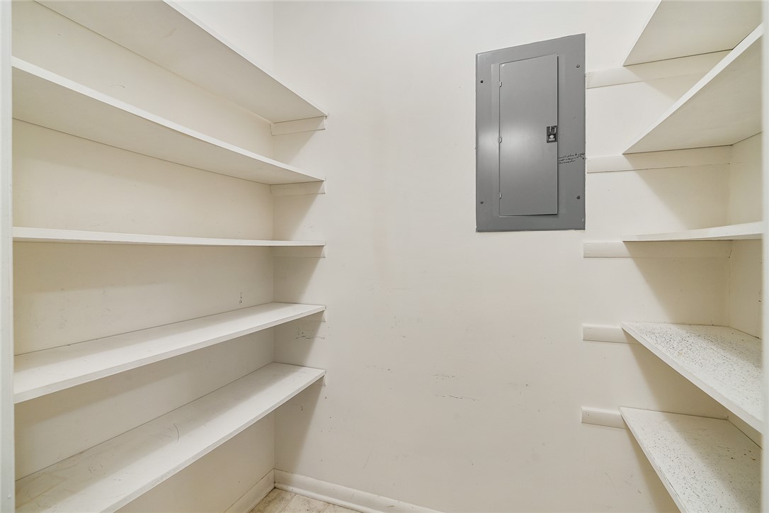 34 Hickory Way Clemson, SC 29631 - Photo 26 of 39 Functional shelving and an electrical panel maximize utility in this dedicated storage space.
