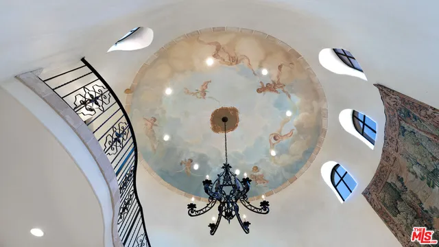 a bathroom with a bathtub sink and mirror