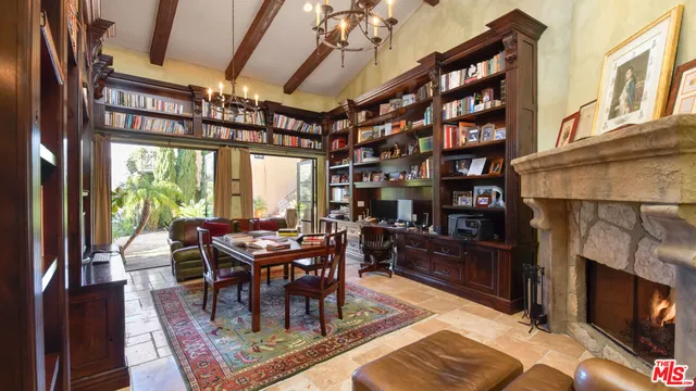 a view of a swimming pool with a yard