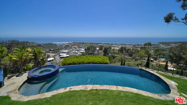 a view of street with lots of trees
