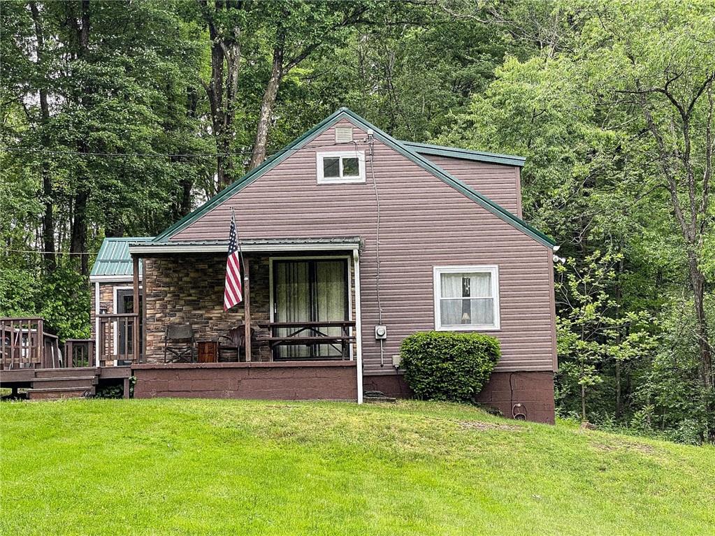 141 Minich Road Butler, PA 16001 - Photo 1 of 26 a view of a house with backyard