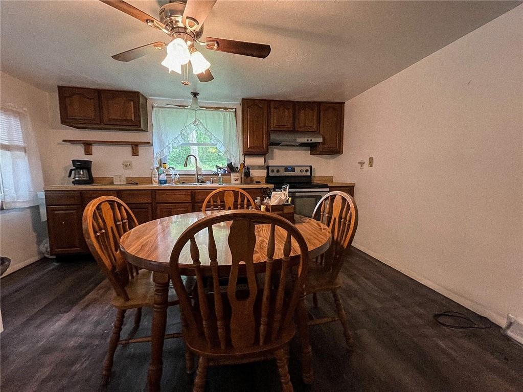 141 Minich Road Butler, PA 16001 - Photo 11 of 26 a view of a dining room with furniture window and wooden floor
