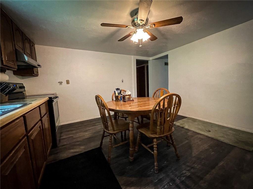 141 Minich Road Butler, PA 16001 - Photo 16 of 26 a view of a dining room with furniture and chandelier