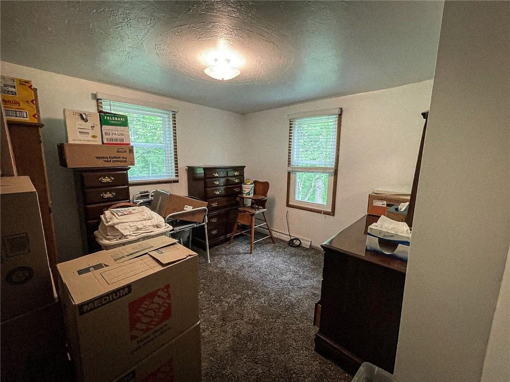 141 Minich Road Butler, PA 16001 - Photo 19 of 26 a room with furniture and a window