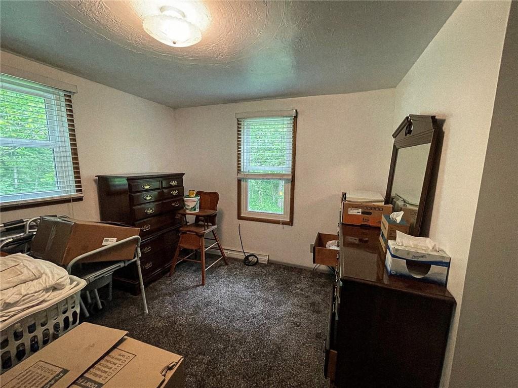 141 Minich Road Butler, PA 16001 - Photo 20 of 26 a bedroom with furniture and a window