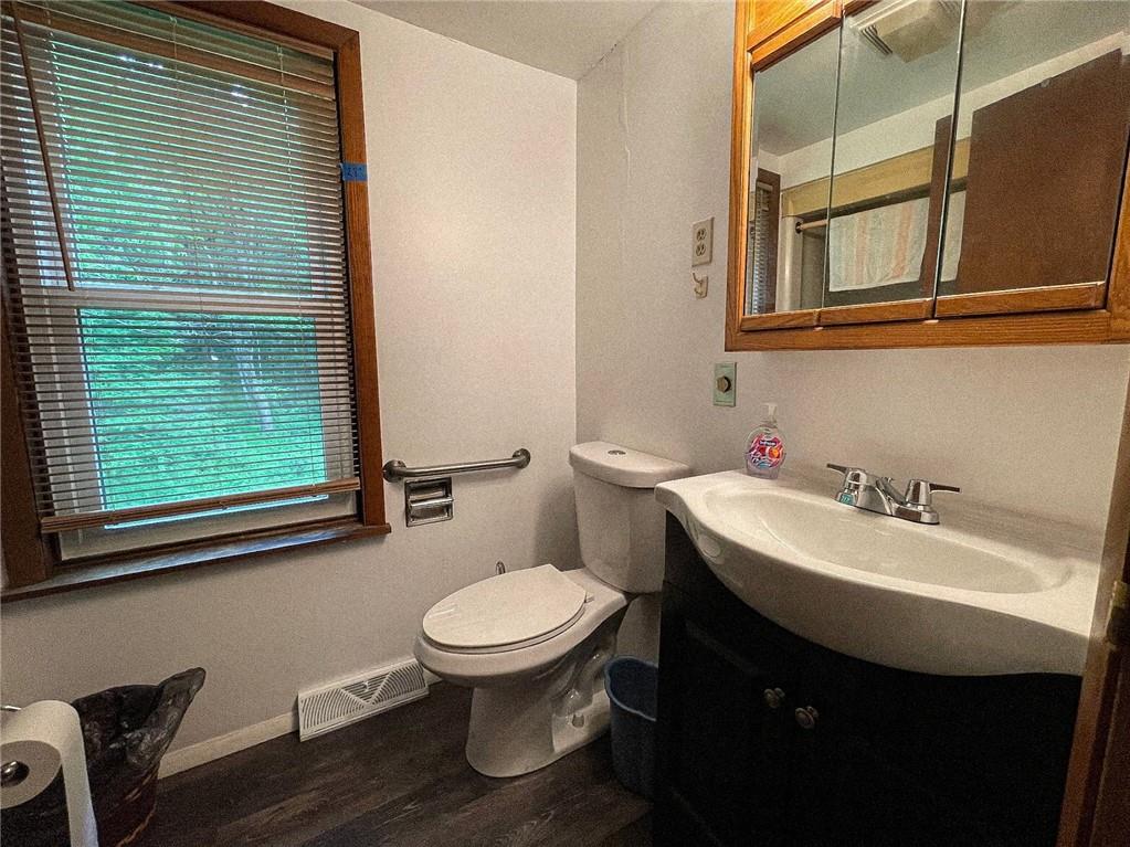 141 Minich Road Butler, PA 16001 - Photo 21 of 26 a bathroom with a sink toilet and mirror