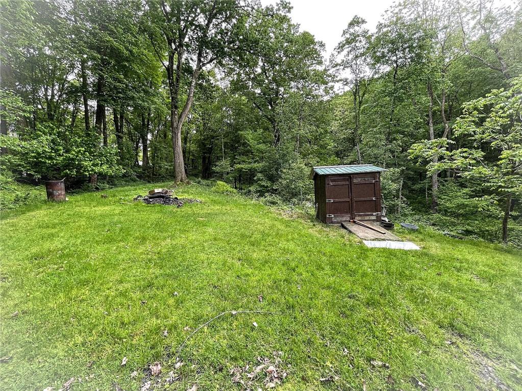 141 Minich Road Butler, PA 16001 - Photo 24 of 26 a backyard of a house with table and chairs