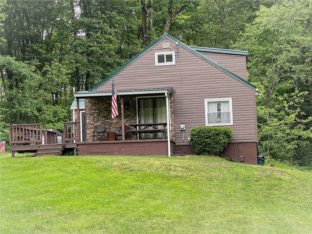141 Minich Road Butler, PA 16001 - Photo 25 of 26 a view of a house with a yard and sitting area
