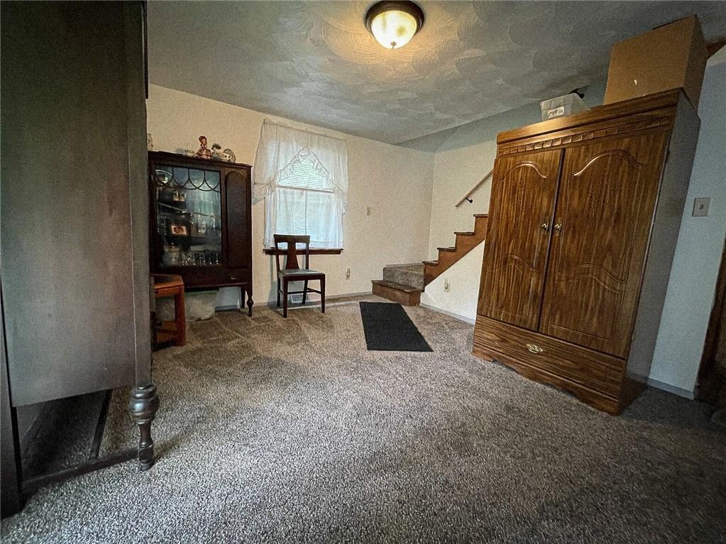 141 Minich Road Butler, PA 16001 - Photo 5 of 26 a view of an empty room with stairs