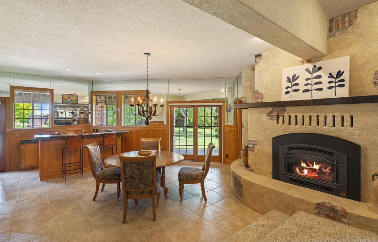 7583 East Realty Road Lodi, CA 95240 - Photo 4 of 41 Dining area and adjoining wet bar with access to the patio and pool area make entertaining an ease!