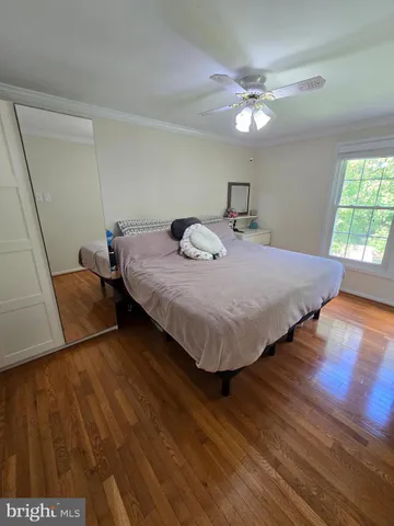 a backyard of a house with a table and chairs
