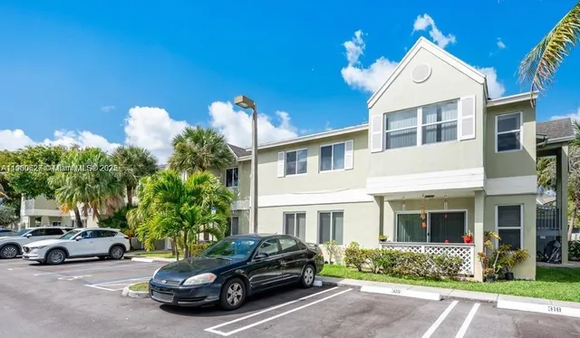 a car parked in front of a building