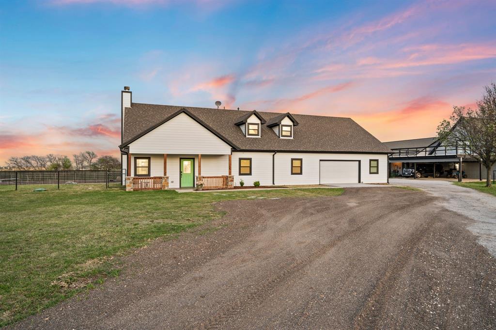 7384 Rector Road Sanger, TX 76266 - Photo 1 of 40 a front view of a house with a yard