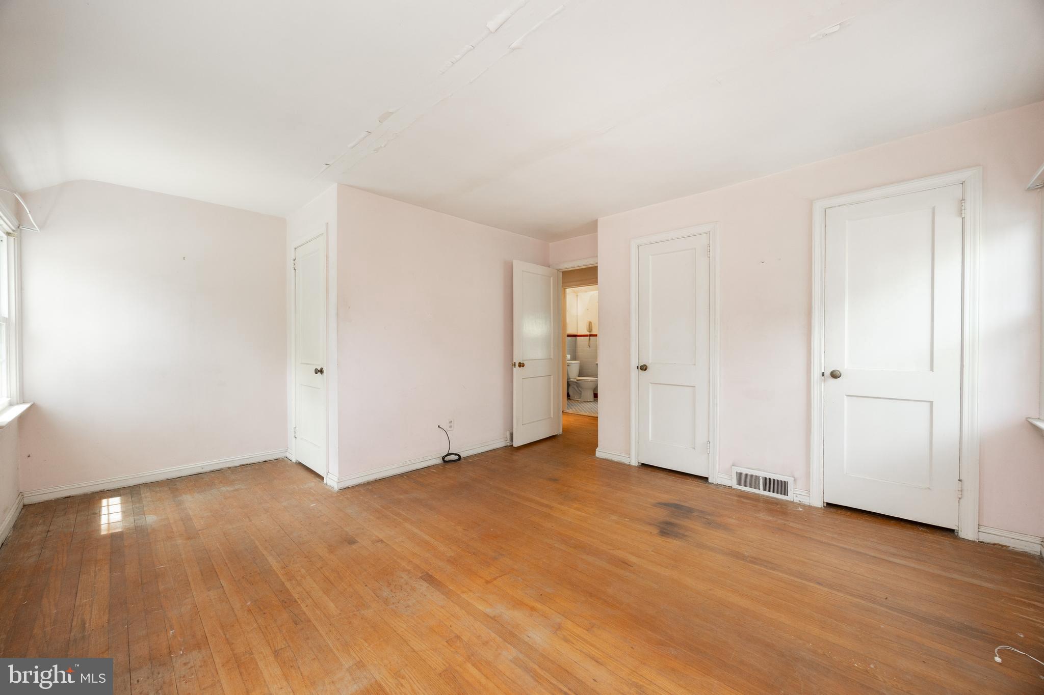 314 Spring Valley Road Springfield, PA 19064 - Photo 28 of 43 a view of an empty room and wooden floor