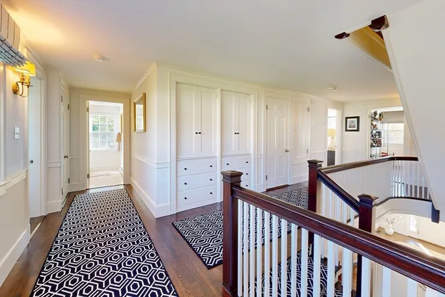 a view of a hallway view with staircase