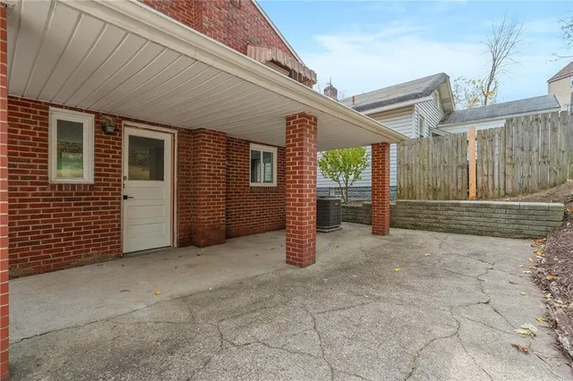 a view of a porch with hardwood
