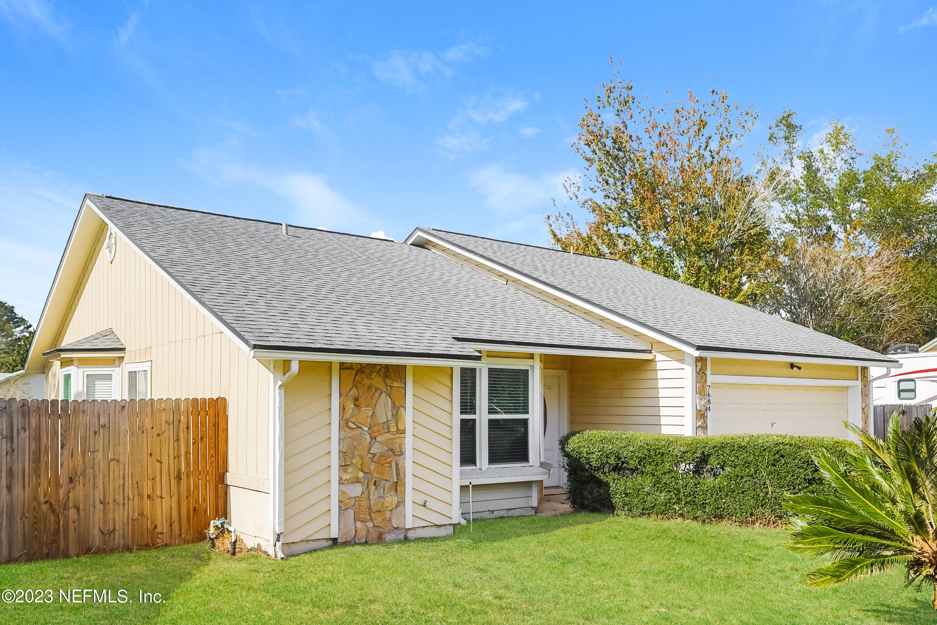 7684 Collins Ridge Boulevard Jacksonville, FL 32244 - Photo 2 of 15 a view of a house with a backyard