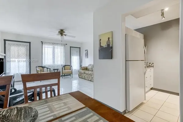 a view of a livingroom with furniture and window