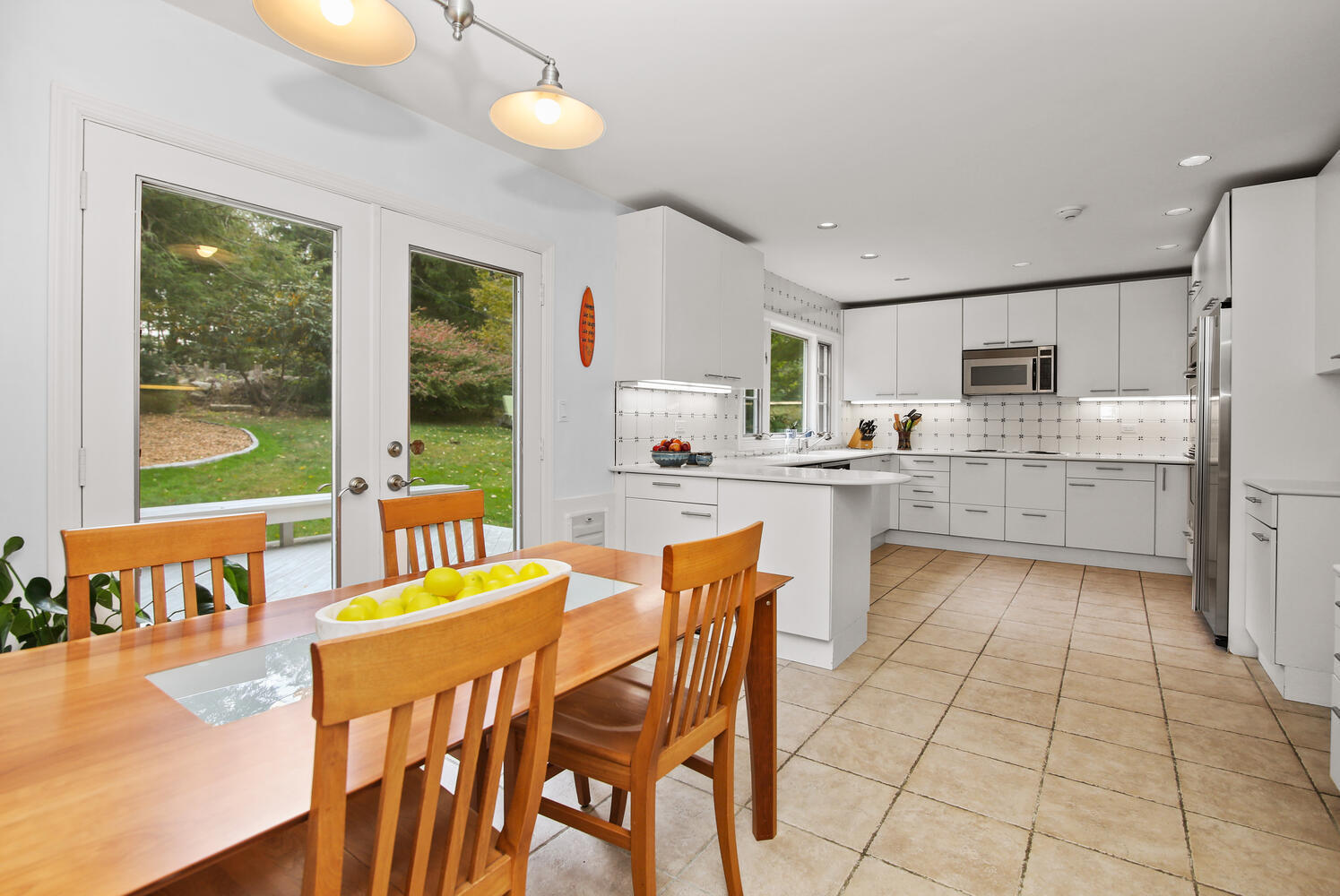 57 Laurel Road New Canaan, CT 06840 - Photo 9 of 29 Eat In Kitchen opens to Deck