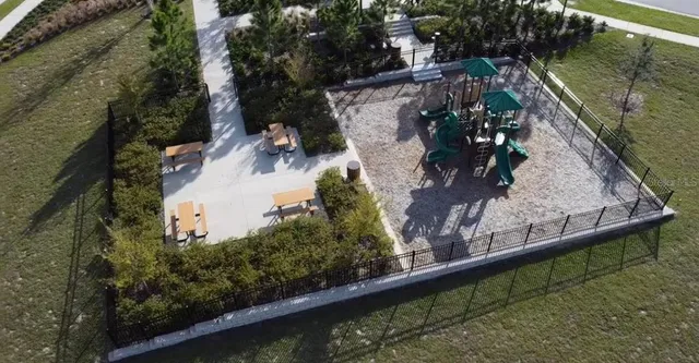 a view of swimming pool with a yard