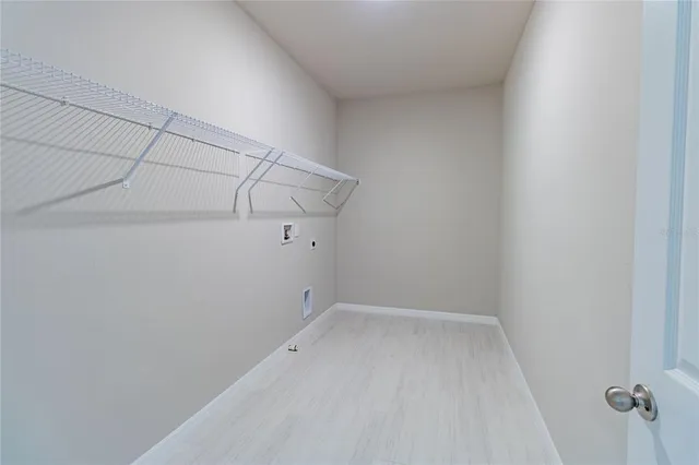 a view of a room with racks on the wall