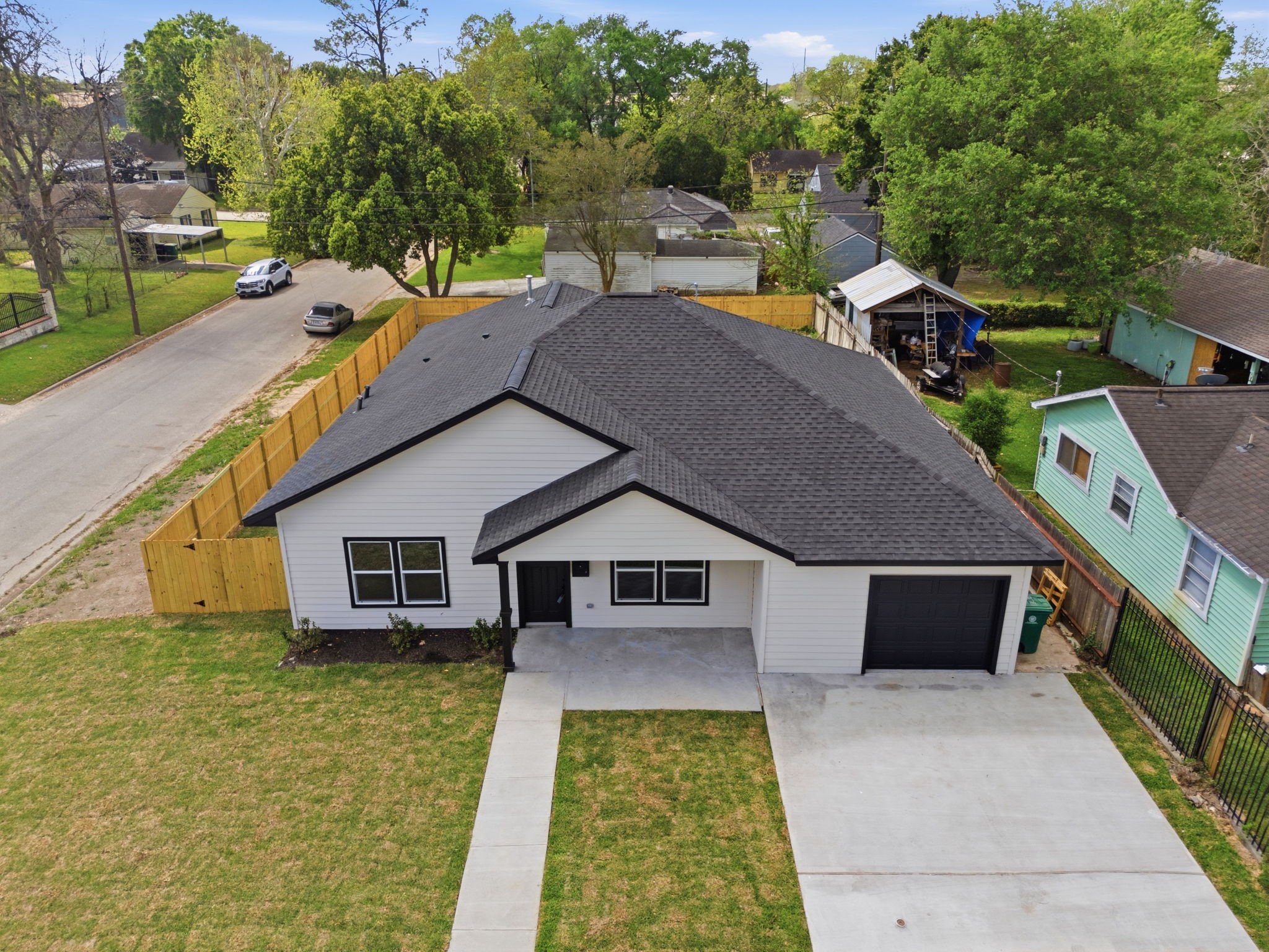 7040 Kinney Street Houston, TX 77087 - Photo 6 of 47 a aerial view of a house with a yard