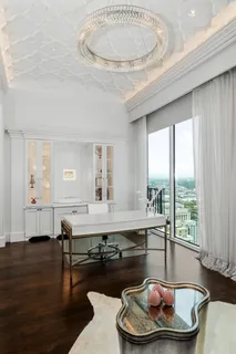 a view of a livingroom with furniture and window