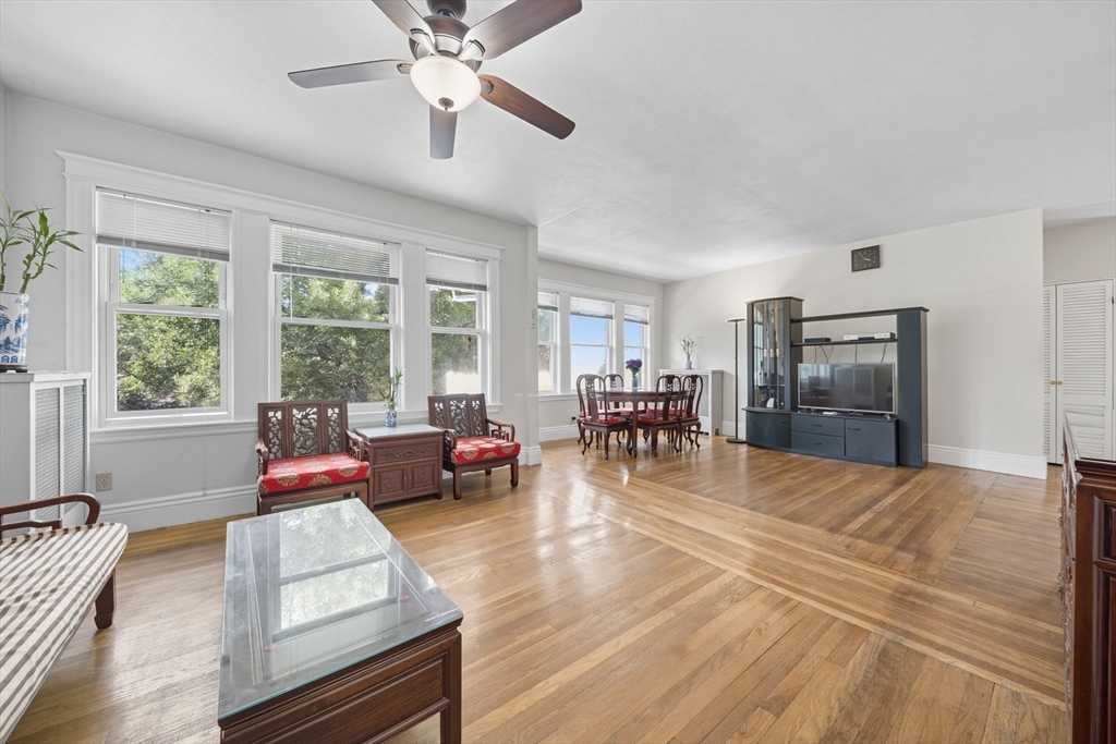 28 Verndale Street Brookline, MA 02446 - Photo 15 of 42 a living room with furniture and wooden floor