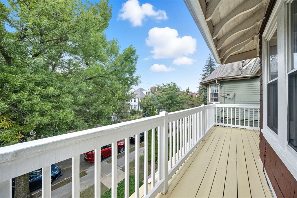 28 Verndale Street Brookline, MA 02446 - Photo 34 of 42 a balcony with wooden floor and fence