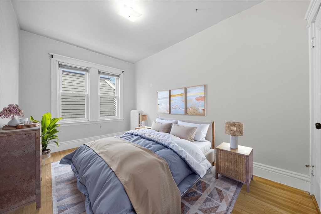 28 Verndale Street Brookline, MA 02446 - Photo 7 of 42 a bedroom with a bed and a window