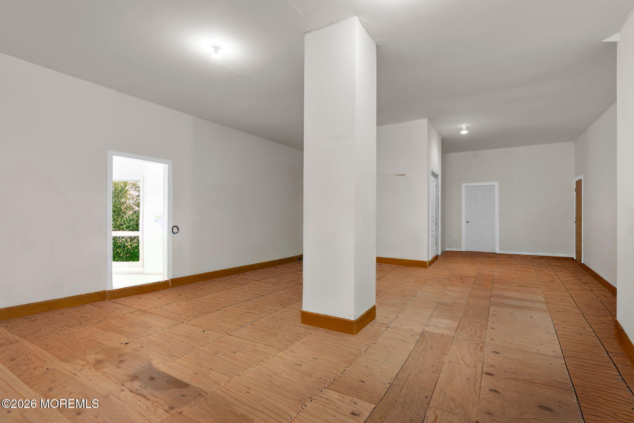 672 Winding River Road Brick, NJ 08724 - Photo 100 of 111 a view of an empty room with a window