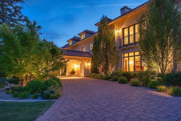 a view of a building with a yard