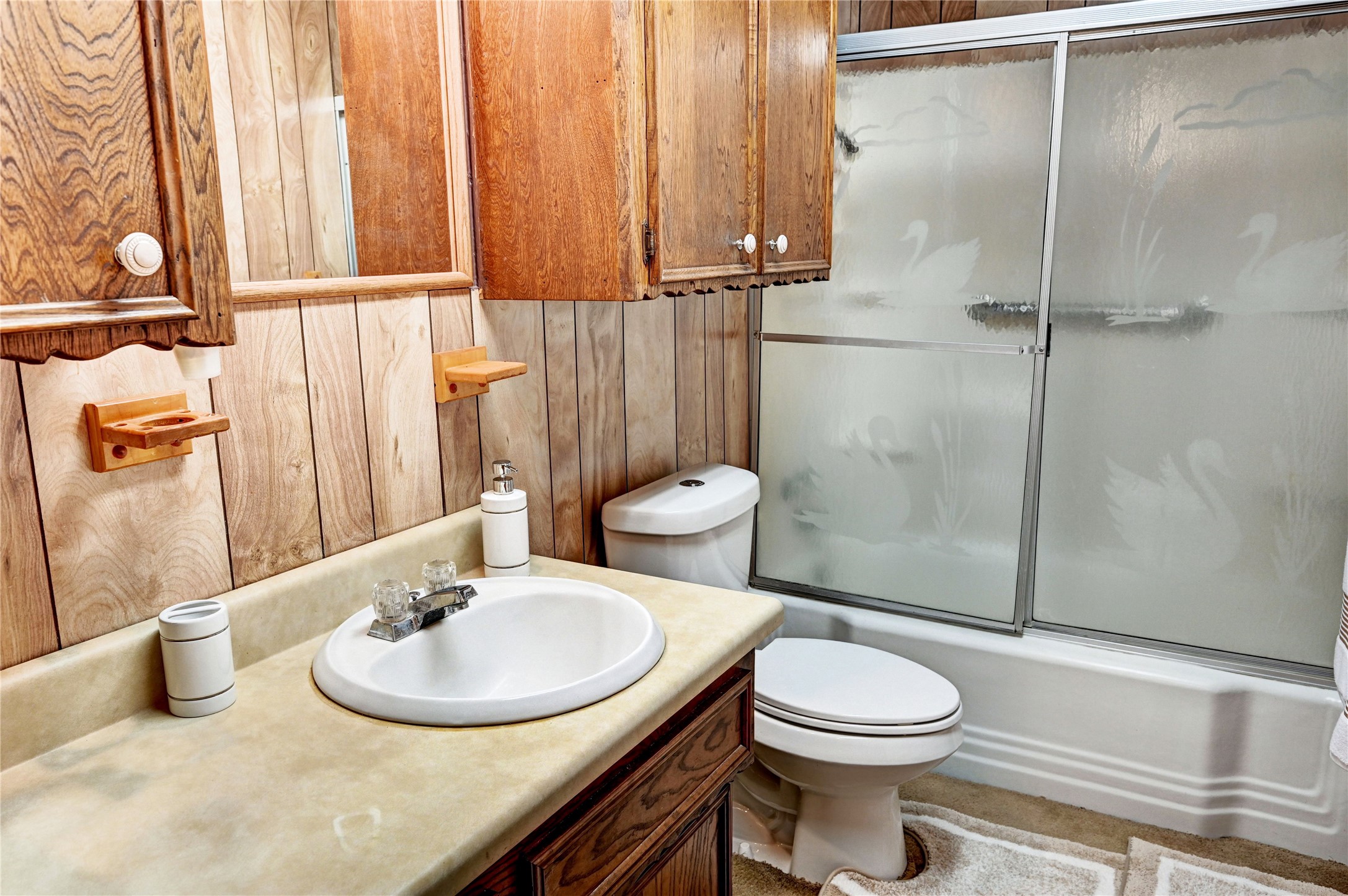 6 Hickory Hollow Road Huntsville, TX 77320 - Photo 33 of 44 a bathroom with a sink toilet and shower