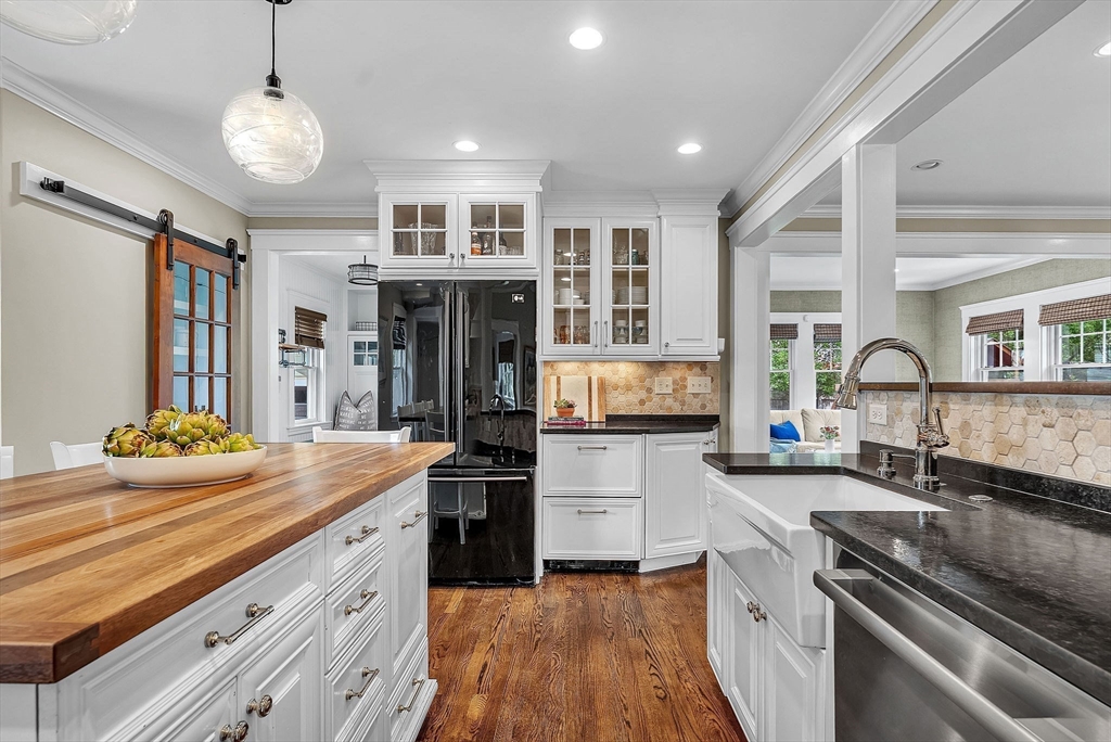 3 Thorpe Road Needham, MA 02494 - Photo 14 of 36 a kitchen that has a lot of cabinets in it