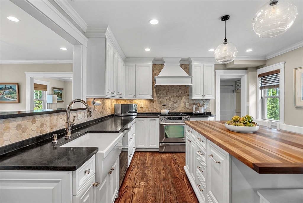 3 Thorpe Road Needham, MA 02494 - Photo 15 of 36 a kitchen with sink stove and cabinets