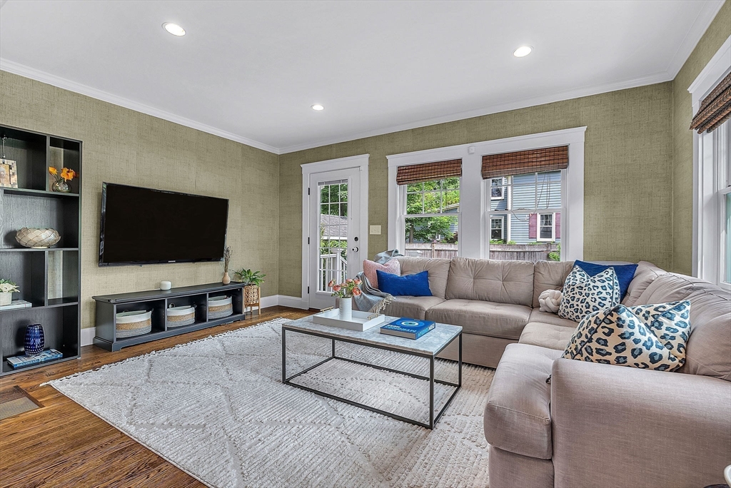 3 Thorpe Road Needham, MA 02494 - Photo 17 of 36 a living room with furniture and a flat screen tv