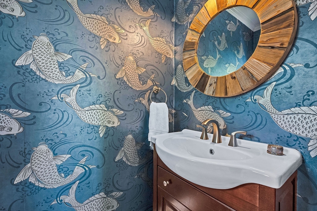 3 Thorpe Road Needham, MA 02494 - Photo 20 of 36 a bathroom with a sink and mirror