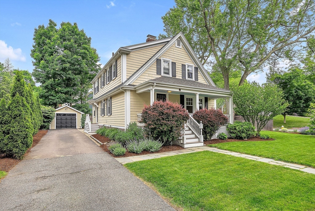 3 Thorpe Road Needham, MA 02494 - Photo 2 of 36 a view of a house with a yard and potted plants